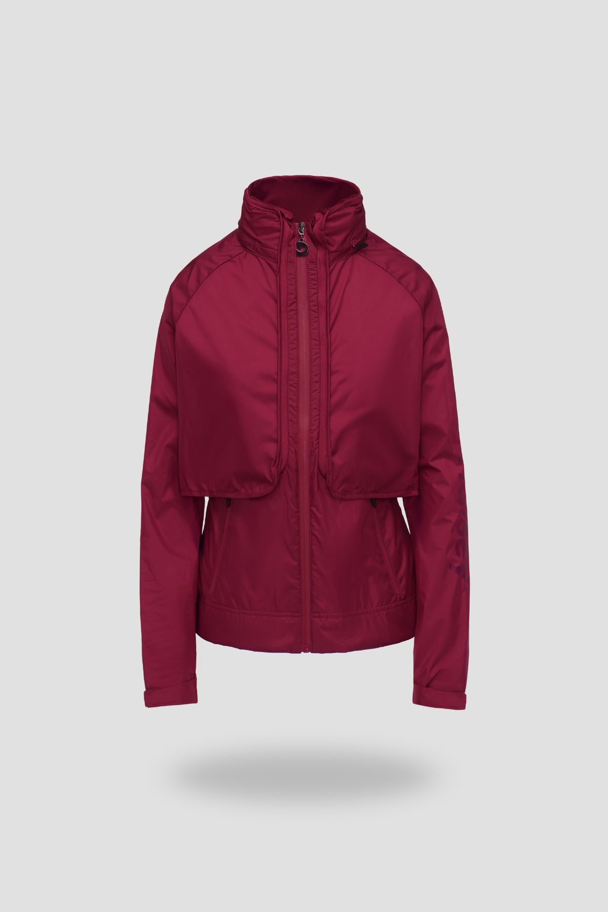 Burgundy beaujolais jacket on a light grey background