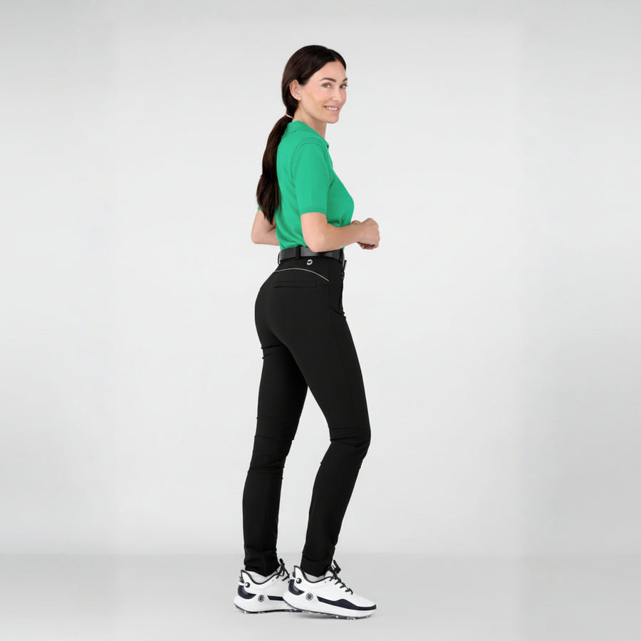 Color:Night Woman wearing a cashmere green shirt and slimming black athletic leisure Inka pants on a white background