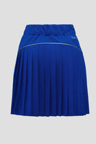 Color:Blu A royal blue pleated athletic skirt shown from the back with an elastic waistband and diagonal pockets 