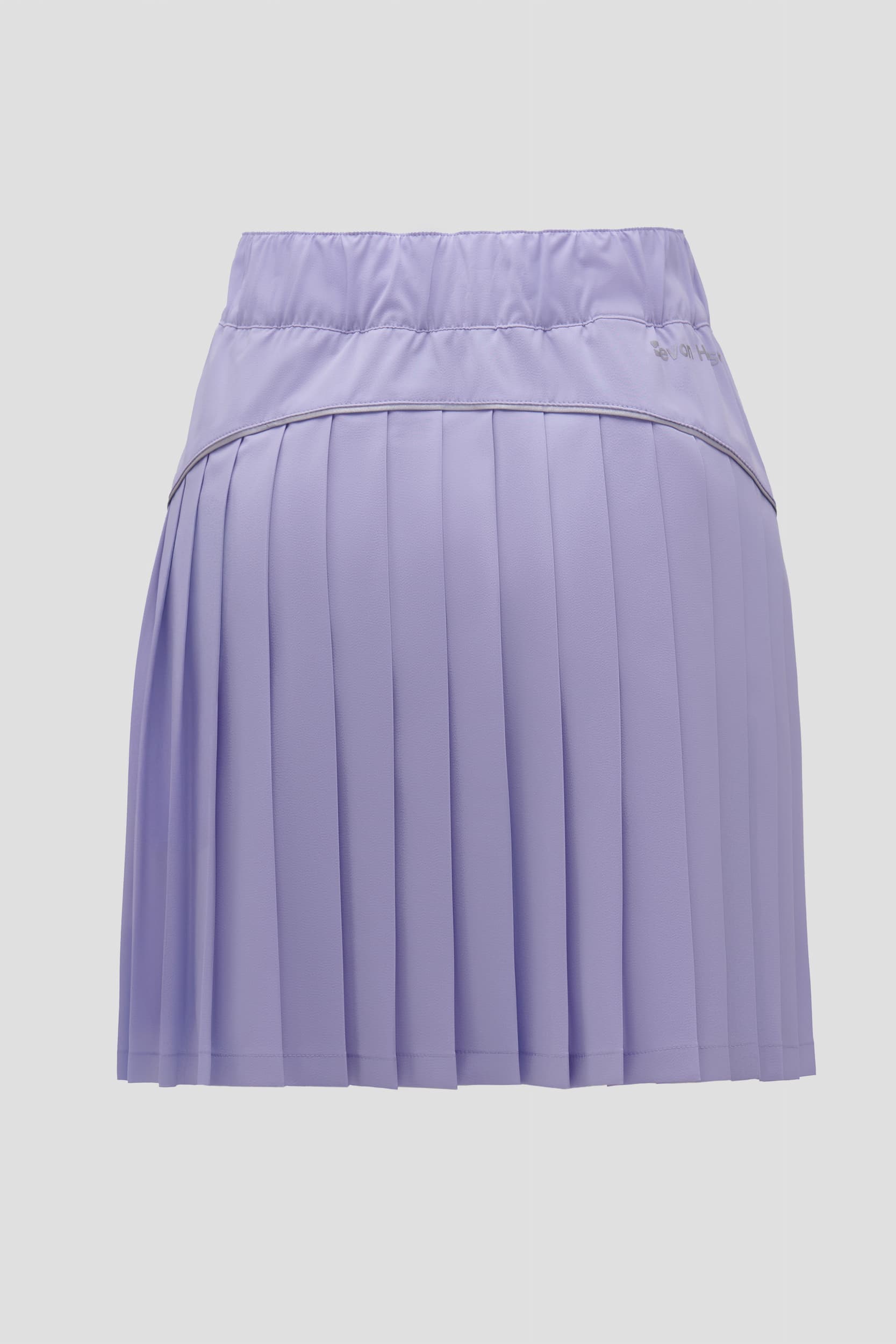 Color:Lavender A lavender pleated athletic skort with a high-waisted, elastic waistband