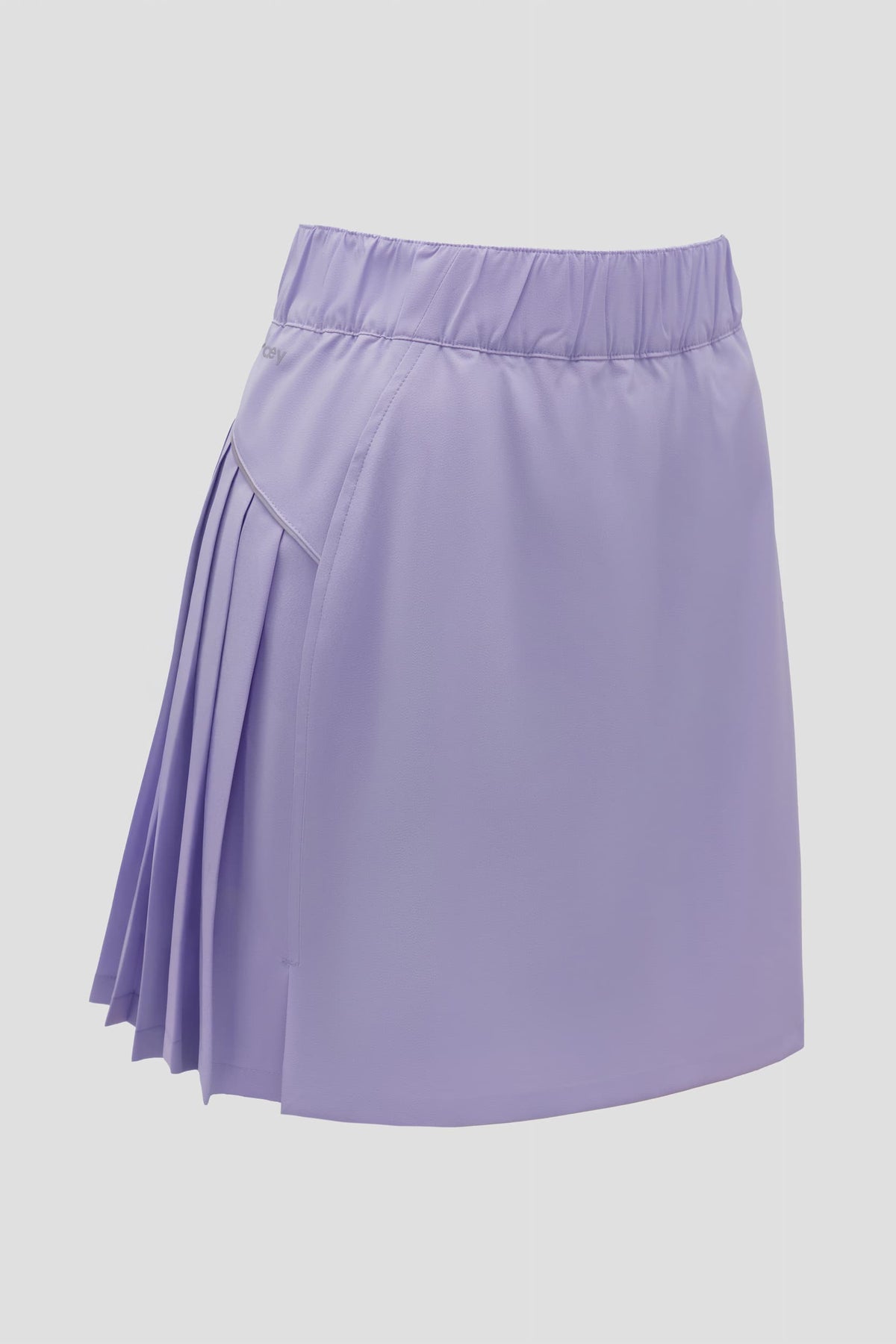 Color:Lavender A light purple athletic skort with an elastic waistband and pleated back detail