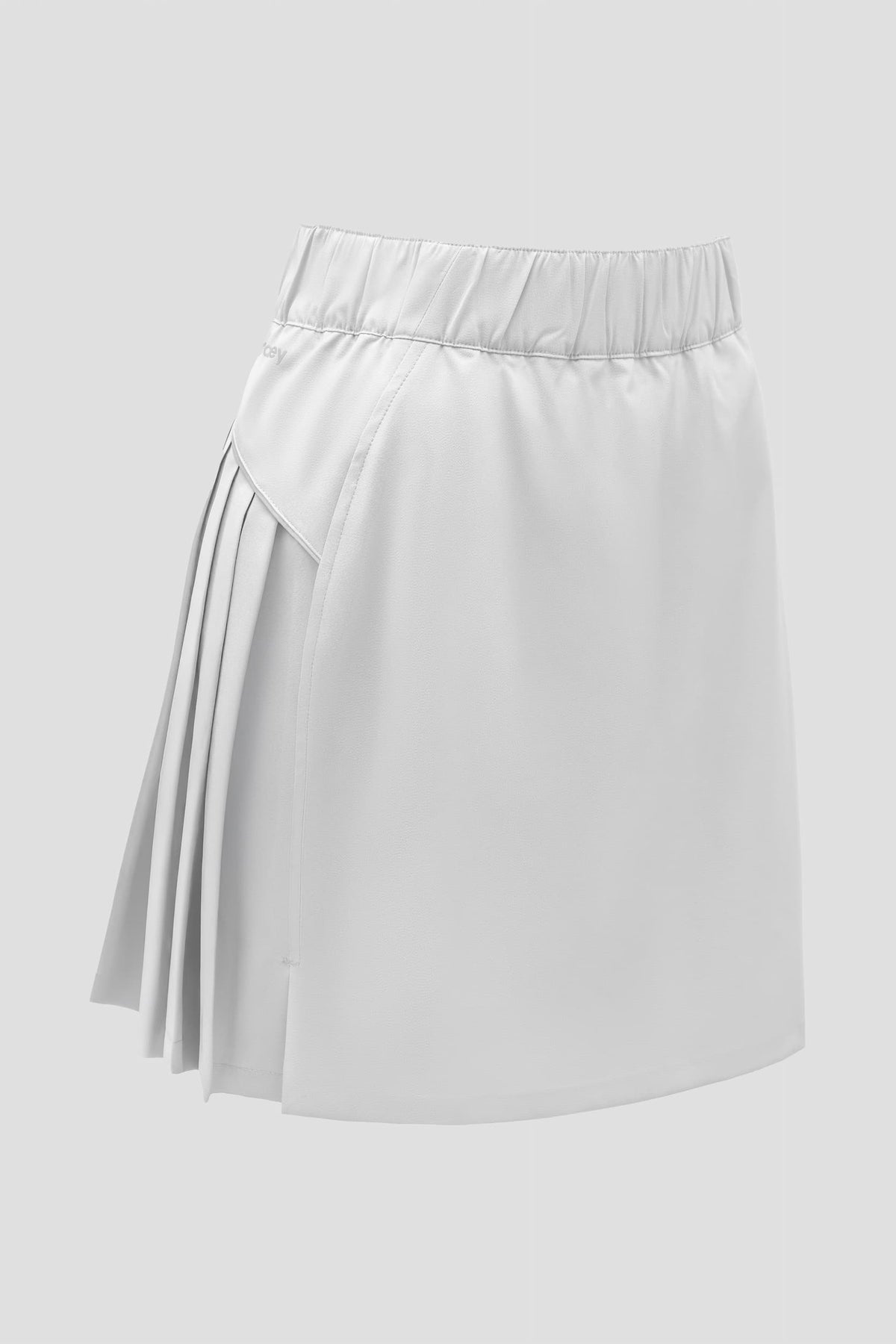 Color:Vapor Grey A vapor grey athletic skort with an elastic waistband and pleated back detail