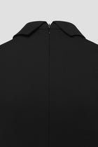 Close-up of a black Jana dress with a zipper