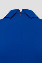 Close-up of a back side blue golf and tennis dress with a collar