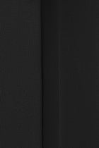 Close-up of a black pique knit texture